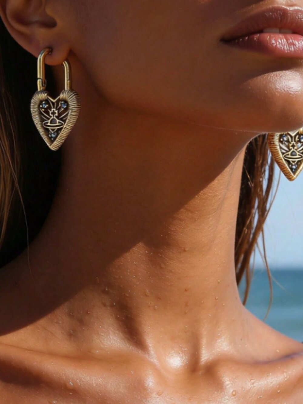 Vivienne Westwood Gold Heart Earrings with Blue Crystal Accents